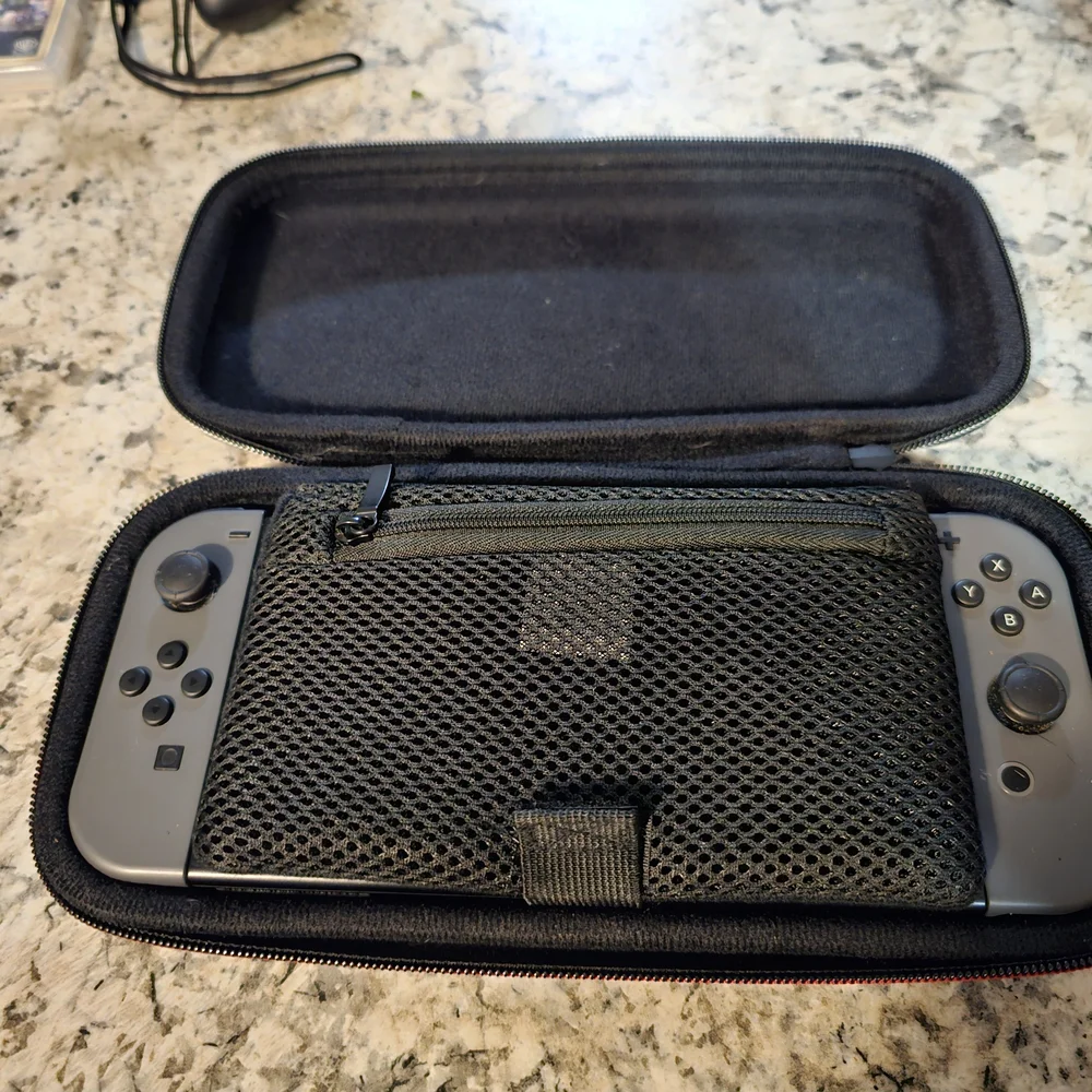 Nintendo Switch with Gray Joy-Con Controllers, Joy Con Grip, And 2 Games. No Doc